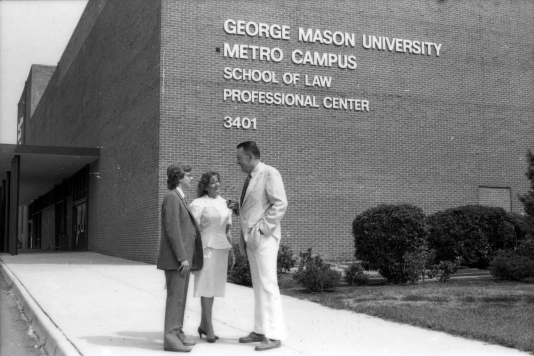 John T. "Til" Hazel and students in front of the George Mason University School of Law, Original Building