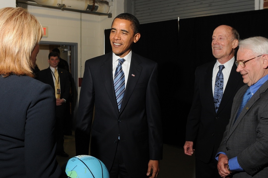President-elect Barack Obama meets with George Mason University personnel during his visit to George Mason University's Center for the Arts in 2009.