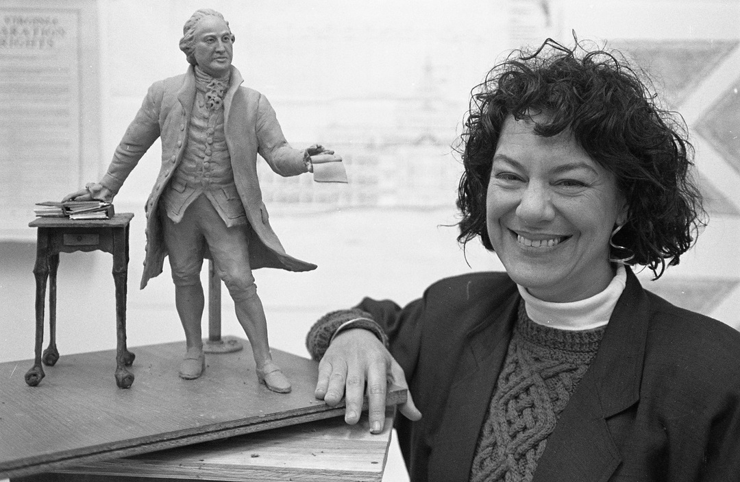 Wendy M. Ross with model of the George Mason statue