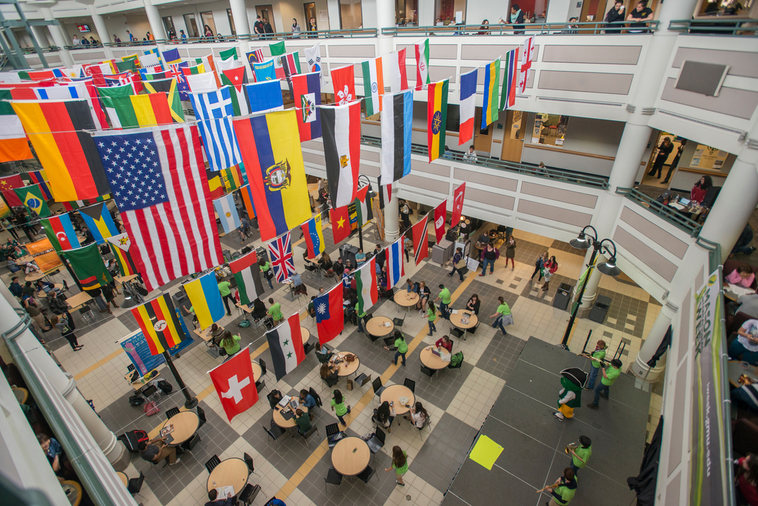 Flags hang in the George W. Johnson Learning Center during International Week 